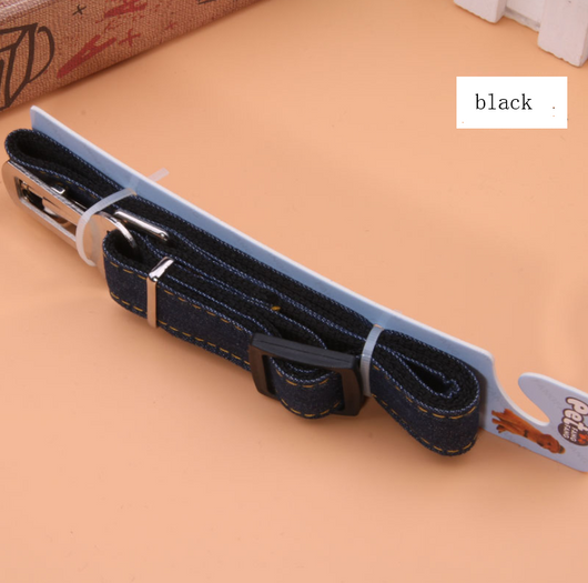 Dark blue denim pet car seat belt with yellow stitching, metal buckle, and plastic adjuster on a hanger. - Image 4