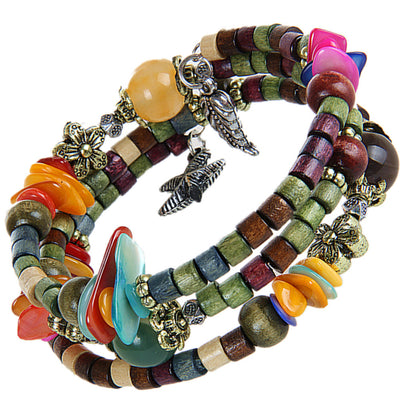 Pulsera de Madera Vintage con Cuentas Budistas y Detalles en Concha