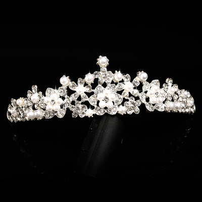 Bridal jewelry set with a silver-tone necklace and matching drop earrings, featuring crystal flowers and faux pearls. - Image 4