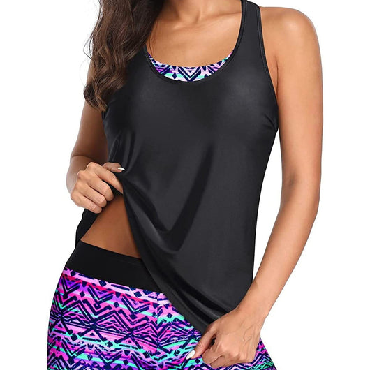 Women's three-piece swimsuit with a black tankini top, colorful geometric patterned bikini top, and matching swim shorts. - Image 5