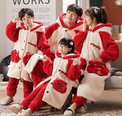 Family of four wearing matching red and cream coral velvet hooded pajamas with embroidered 'money' text and cute pockets. - Image 2