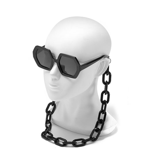 Octagonal sunglasses with brown gradient lenses and a tortoiseshell chain strap on a white background. - Image 3