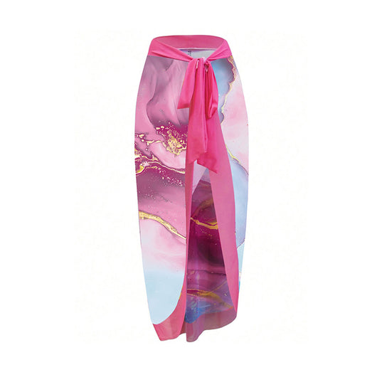 Women's one-piece swimsuit and matching sarong with a pink, blue, and gold marble print. Features tie-shoulder straps. - Image 4