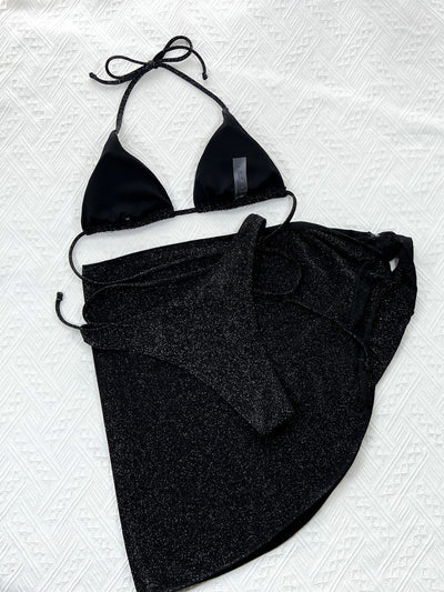 Shimmering green two-piece swimsuit featuring a triangle halter top and a matching sarong-style bottom tied at the front. - Image 7