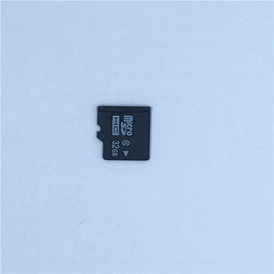 White A9 WIFI wireless network camera with a black lens, shown next to a black 32GB microSD card. - Image 9