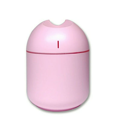 Pink aromatherapy humidifier with a minimalist design and a single mist outlet. - Image 6