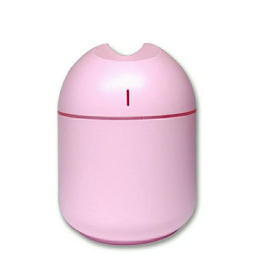 Pink aromatherapy humidifier with a minimalist design and a single mist outlet. - Image 6