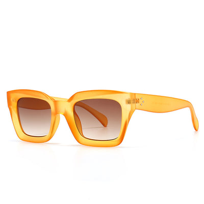 Clear square-framed glasses with a vintage style, featuring a plastic and metal frame and resin lenses. - Image 6