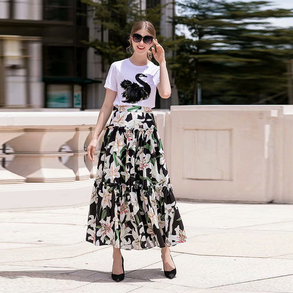 Conjunto Elegante: Blusa Blanca con Falda Midi Negra y Blanca