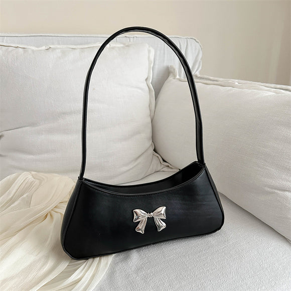 Bolsa de Hombro Minimalista Texturizada con Detalle de Moño Elegante