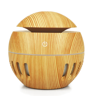 White portable home office humidifier with a spherical base, dome top, and glowing blue LED light accents. - Image 12