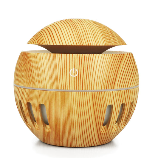 White portable home office humidifier with a spherical base, dome top, and glowing blue LED light accents. - Image 12