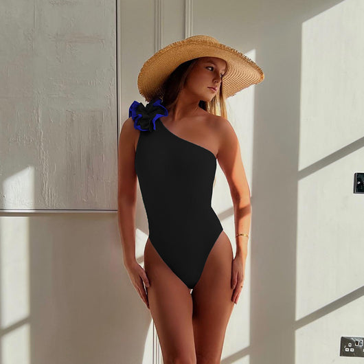 Black one-shoulder ribbed one-piece swimsuit with a ruffled blue and black strap, ideal for women's swimwear. - Image 20