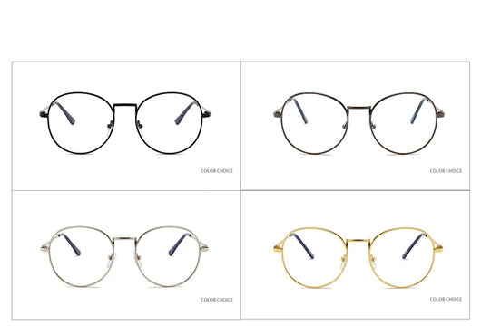 Black round anti-blue light glasses with clear lenses showing a blue reflection, resting on a gray textured surface. - Image 7