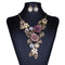 Conjunto de Collar y Aretes Bohemios de Resina Calada