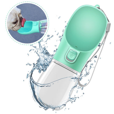 Pink portable pet drinking cup with a clear water reservoir and a paw print button for dispensing water.
