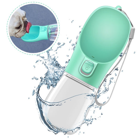 Pink portable pet drinking cup with a clear water reservoir and a paw print button for dispensing water.