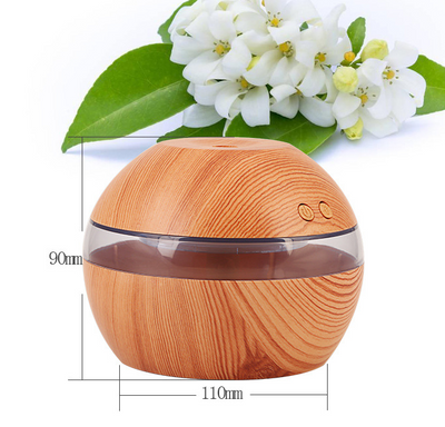 Mini essential oil diffuser humidifier with wood grain finish, USB cable, and instruction manual on a white background. - Image 7