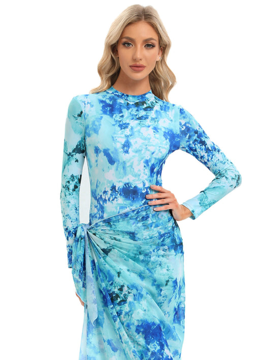 Blue tie-dye conservative beach swimsuit with long sleeves, full-length leggings, and a sheer sarong-style skirt. - Image 17