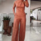 Jumpsuit Elegante de Cintura Alta con Cuello Redondo y Detalles Calados