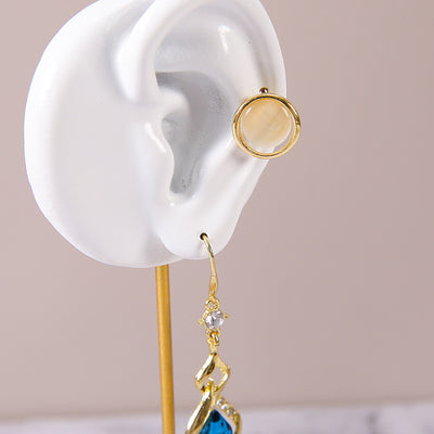 Estante Expositor de Joyas con Diseño de Oreja en Resina y Metal - Image 7