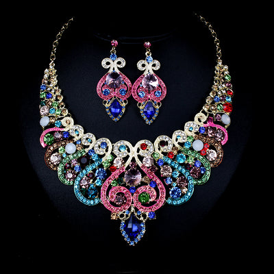 Exaggerated blue rhinestone and pearl bridal necklace and earring set with silver-tone alloy plating. - Image 12