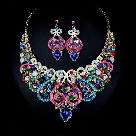 Exaggerated blue rhinestone and pearl bridal necklace and earring set with silver-tone alloy plating. - Image 12