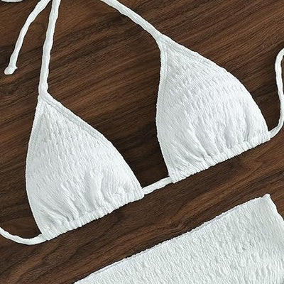 White textured lace-up split bikini swimsuit with a triangle halter top, high-cut bottoms, and matching sarong. - Image 4