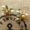 Aretes Retro Flor de Azahar con Perla de Agua Dulce Amarilla y Acabado Lacado Verde