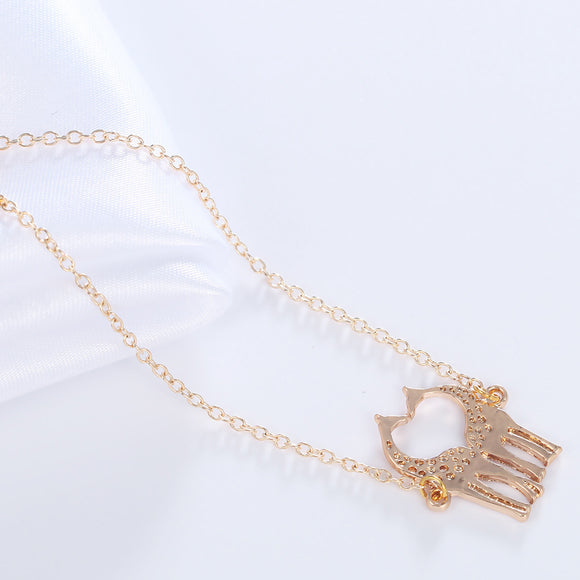 Pulsera de Jirafa con Corazón Dorado y Plateado