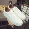 Zapatillas Deportivas Blancas de Cuero con Cordones