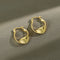 Aretes de plata esterlina con diseño retorcido y acabado brillante