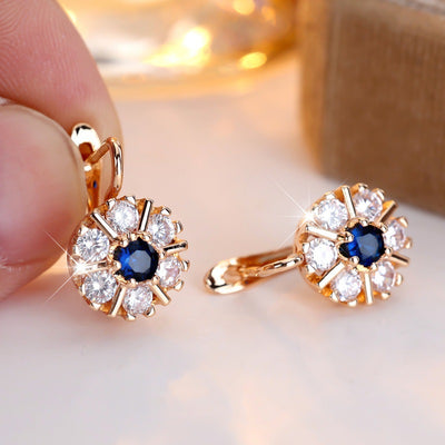 Aretes Flor de Zirconia Blanca y Zafiro Azul - Image 8