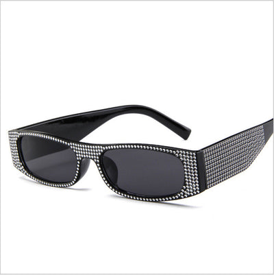 Yellow rectangular sunglasses with clear rhinestone-studded frames and matching yellow lenses.
