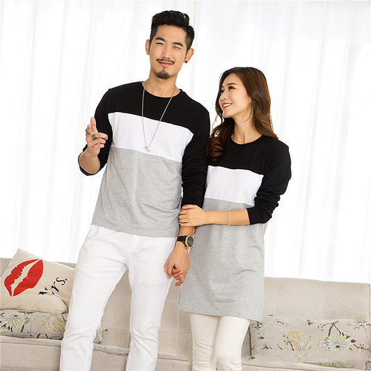 Matching black, white, and grey colorblock long-sleeved t-shirts for couples, worn by a man and a woman.