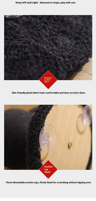 Black cat scratching toy with a sisal-wrapped ball, red devil horns, and black bat wings on a spring base. - Image 7