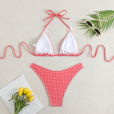 Red and white gingham print bikini swimsuit with a triangle halter top and high-cut bottom, featuring small white bows. - Image 37