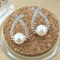 Cross pearl flash drill earrings silvery