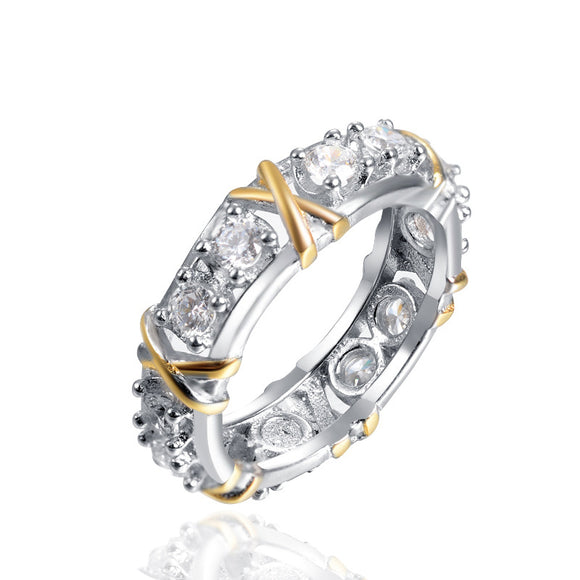 Anillo de Circonita Bicolor con Diseño Cruzado - Joya de Compromiso Premium