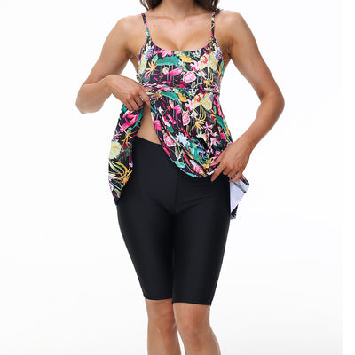 Women's navy blue two-piece swimsuit with white floral tankini top and matching solid swim shorts. - Image 16