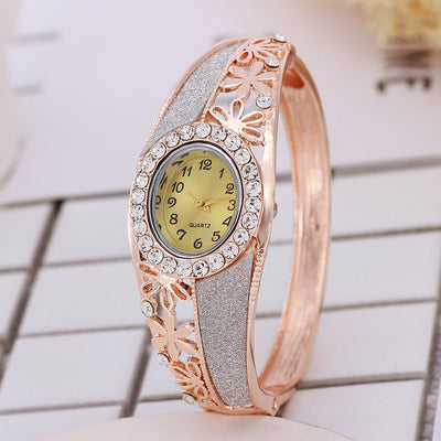 Reloj pulsera para mujer en oro rosado con diseño floral - Image 2