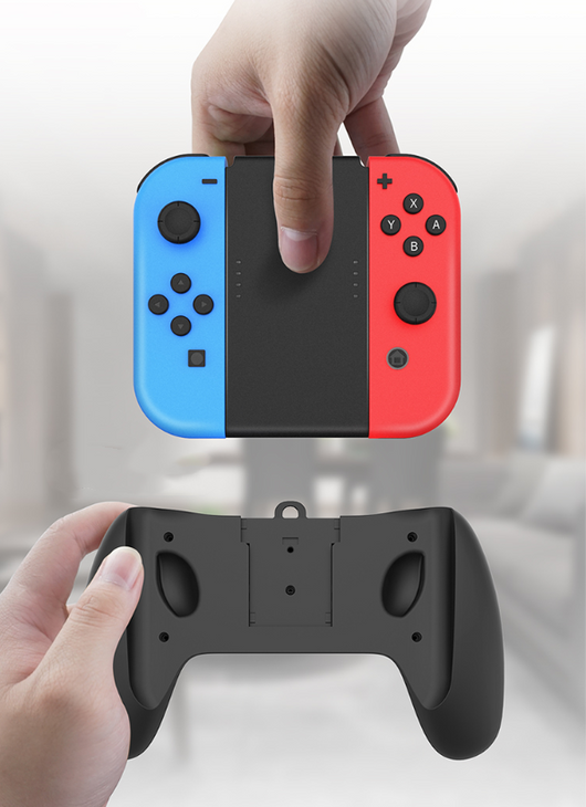 Black charging grip for Nintendo Switch Joy-Cons, shown in packaging and as a standalone unit, with blue and red controllers. - Image 5