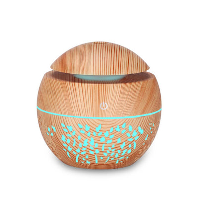 Dark wood grain mini ultrasonic humidifier with a mushroom shape and decorative hollow-out pattern. - Image 4