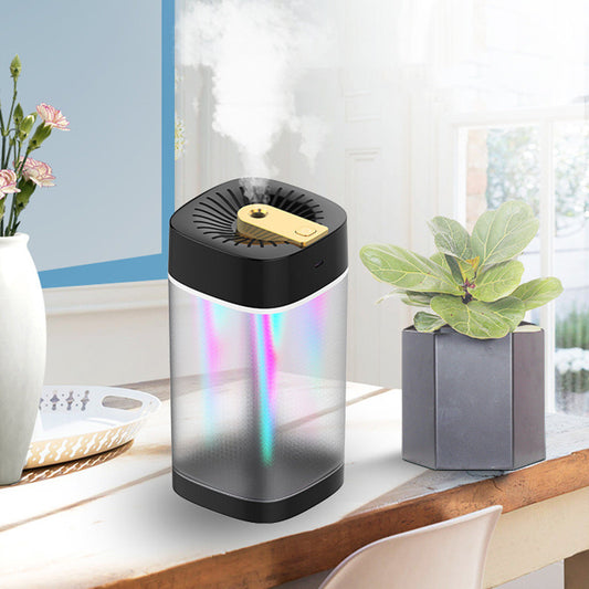 Modern cylindrical USB aroma humidifier with a metallic silver body, white top and base, and a gold mist outlet.