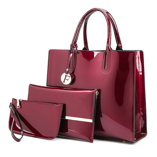 Bolso Maternal de Charol Brillante con Compartimentos Inteligentes