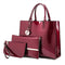 Bolso Maternal de Charol Brillante con Compartimentos Inteligentes