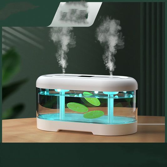 Dark green and clear oval USB humidifier with two mist outlets, shown next to its white product box.