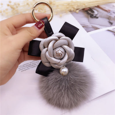 Llavero Decorativo Flor Camelia con Moño para Bolsa de Mujer - Image 8