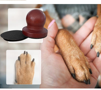 Red wooden dog claw grinding tool with a spherical handle and three circular black abrasive sanding pads. - Image 21