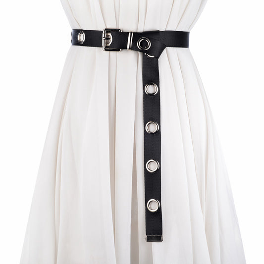 Black canvas belt with silver-tone metal eyelets and a pin buckle, designed to be tied.